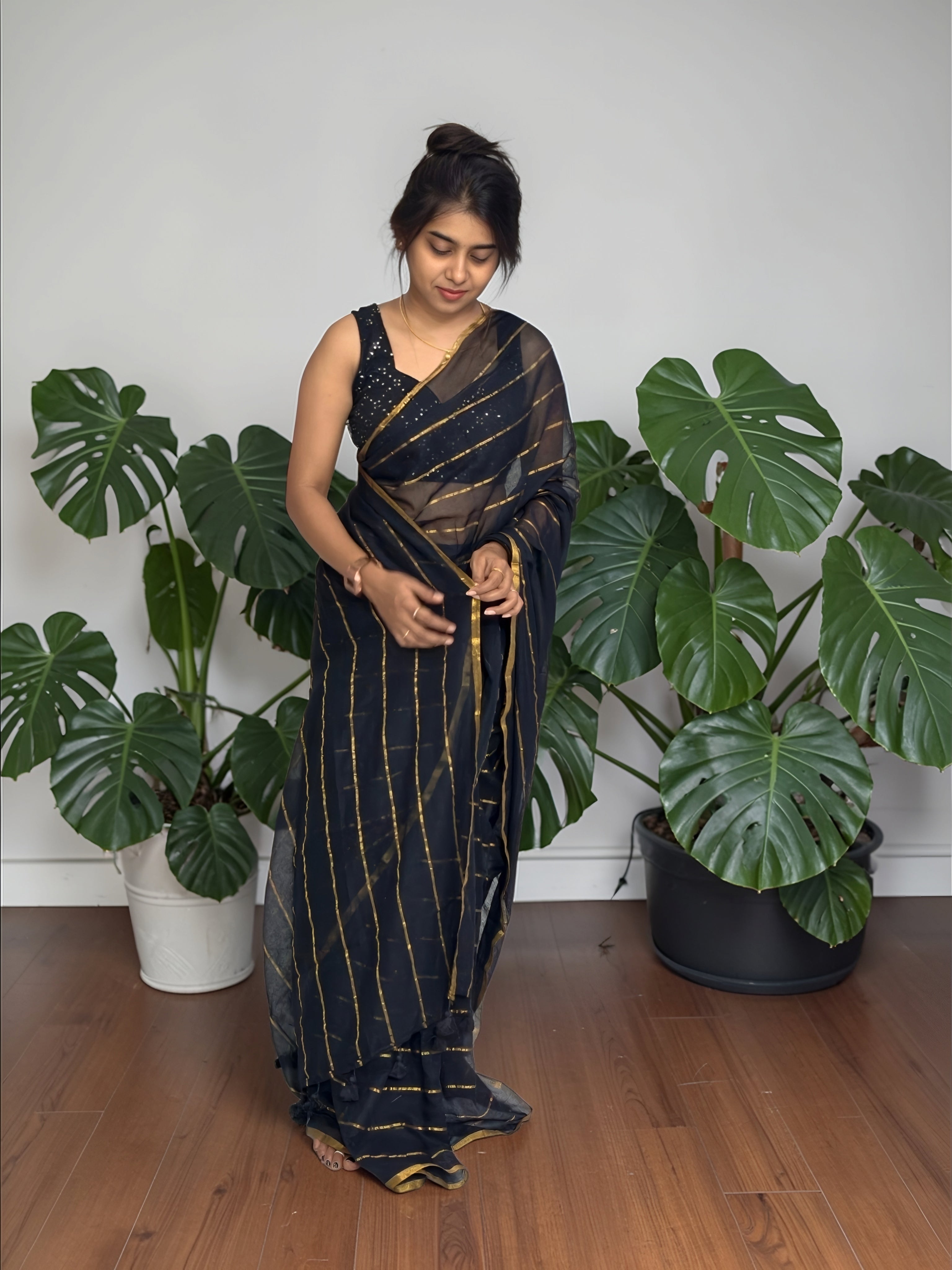 Black mul mul full gold line saree _high quality with tussles